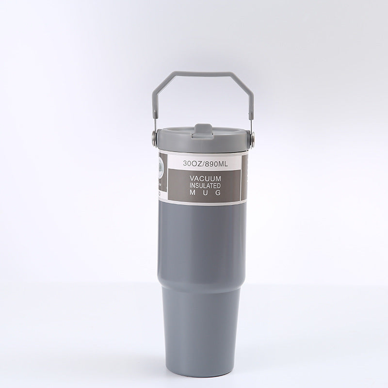 Edelstahl Trinkflasche Auto im pinken Design, isolierter Becher mit Griff und Deckel, ideal für unterwegs.